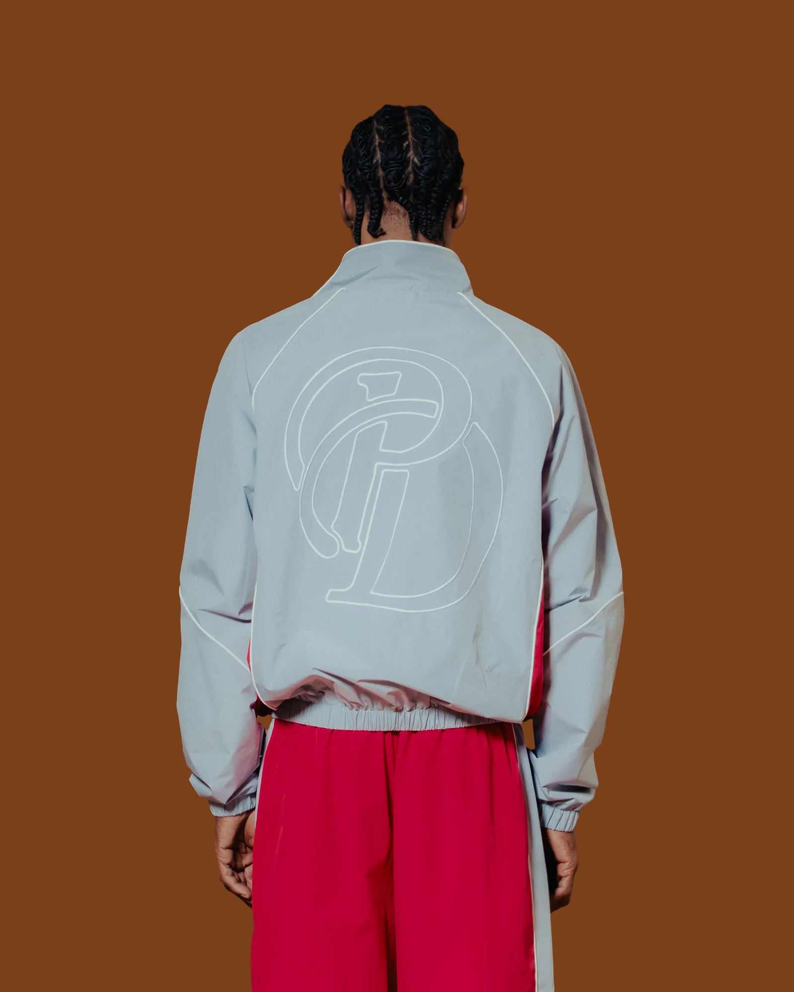 Grey and red Plaisir Dernier track set, back