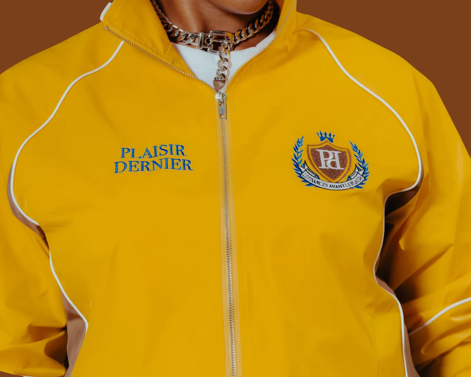 Yellow Plaisir Dernier jacket, chest crest detail